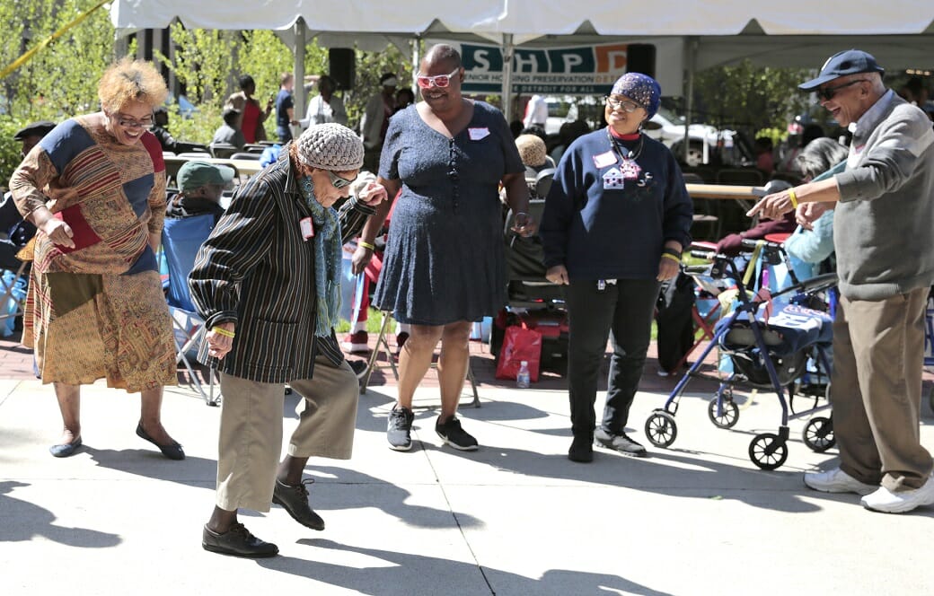 DAAA Members celebrating and fellowing at a community event. | Detroit Area Agency on Aging Workshops and Activities